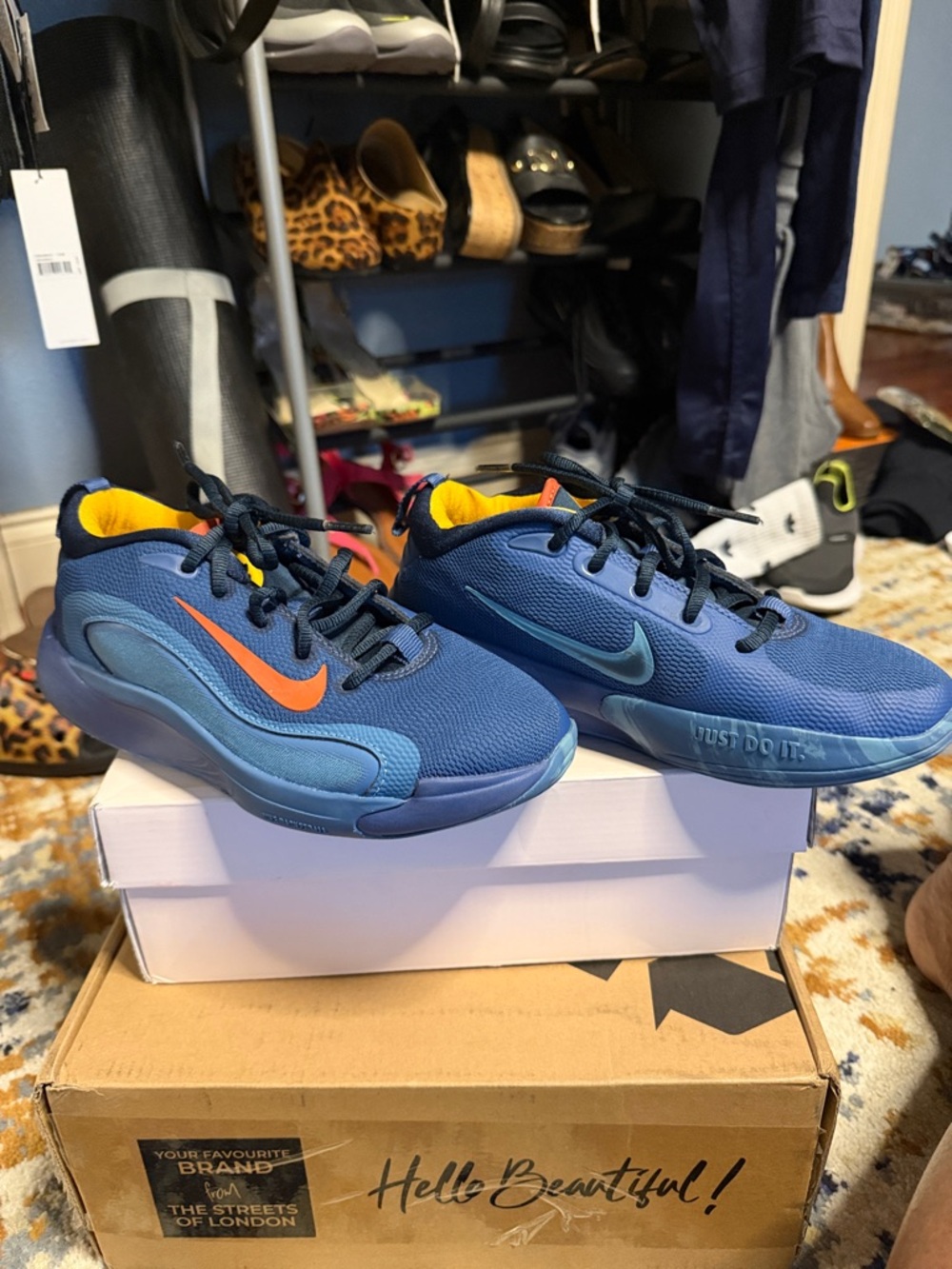 Nike Blue Low-Top Sneakers with Orange & Teal Swooshes